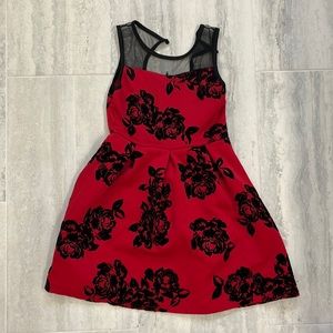 Red dress with felt flowers and mess sleeves